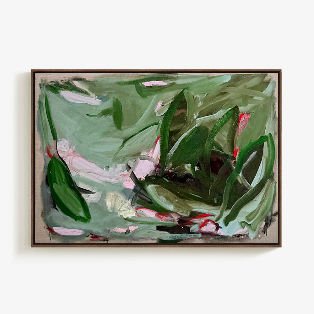 Landscape-oriented abstract painting in a dark wooden frame displaying organic layered green and pink paint strokes