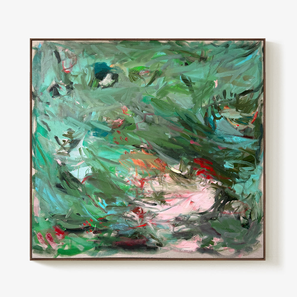 Abstract expressionist painting with energetic green teal and pink strokes housed in a thin dark wood frame