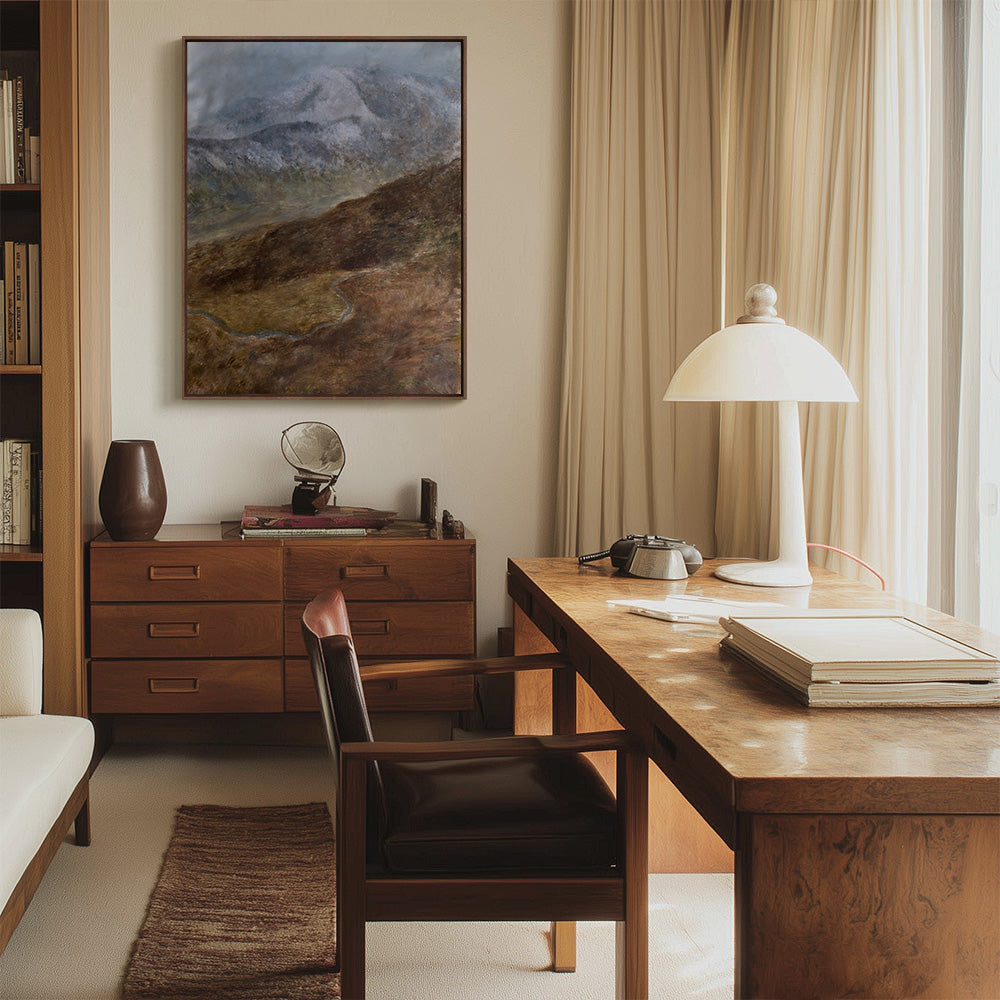 Scottish Highlands 01 painting in a study with a wooden desk table lamp and bookshelf