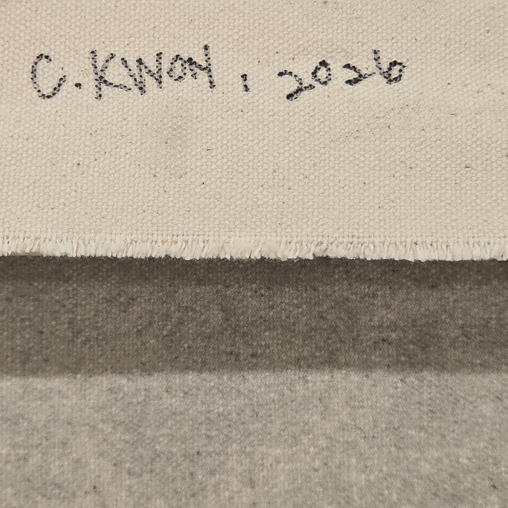 Close-up detail of a canvas edge showing the artist signature C KWON and the year 2020