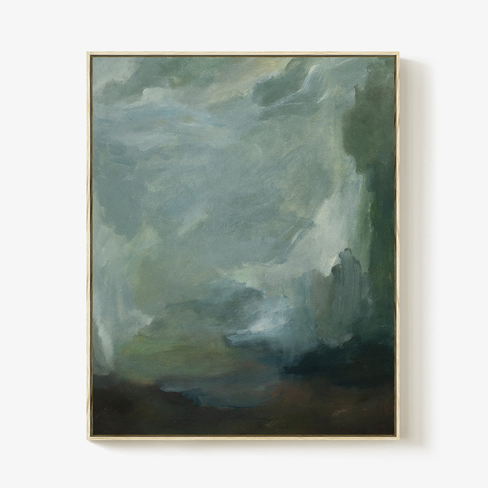 Vertical abstract painting with swirling blues greens and browns framed in light wood against a white wall