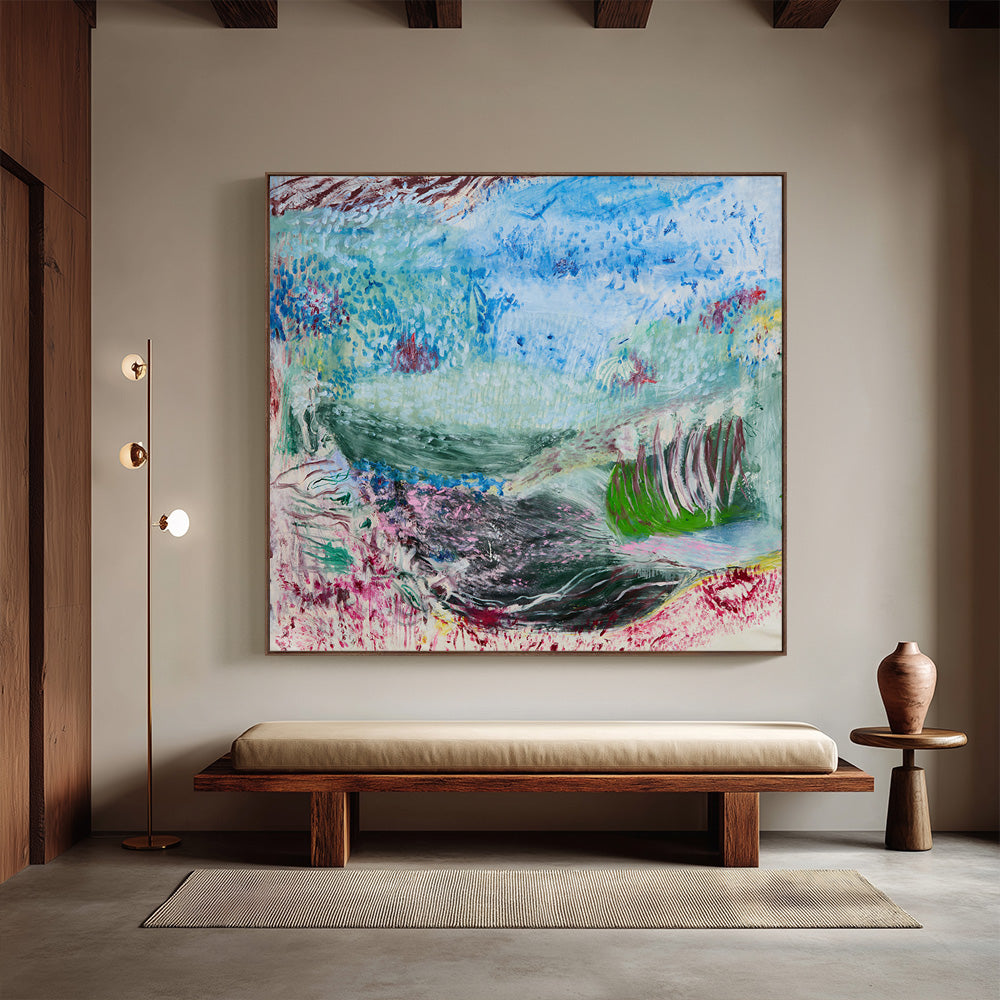 Abstract expressionist painting with blue green and dark tones in a warm living room setting
