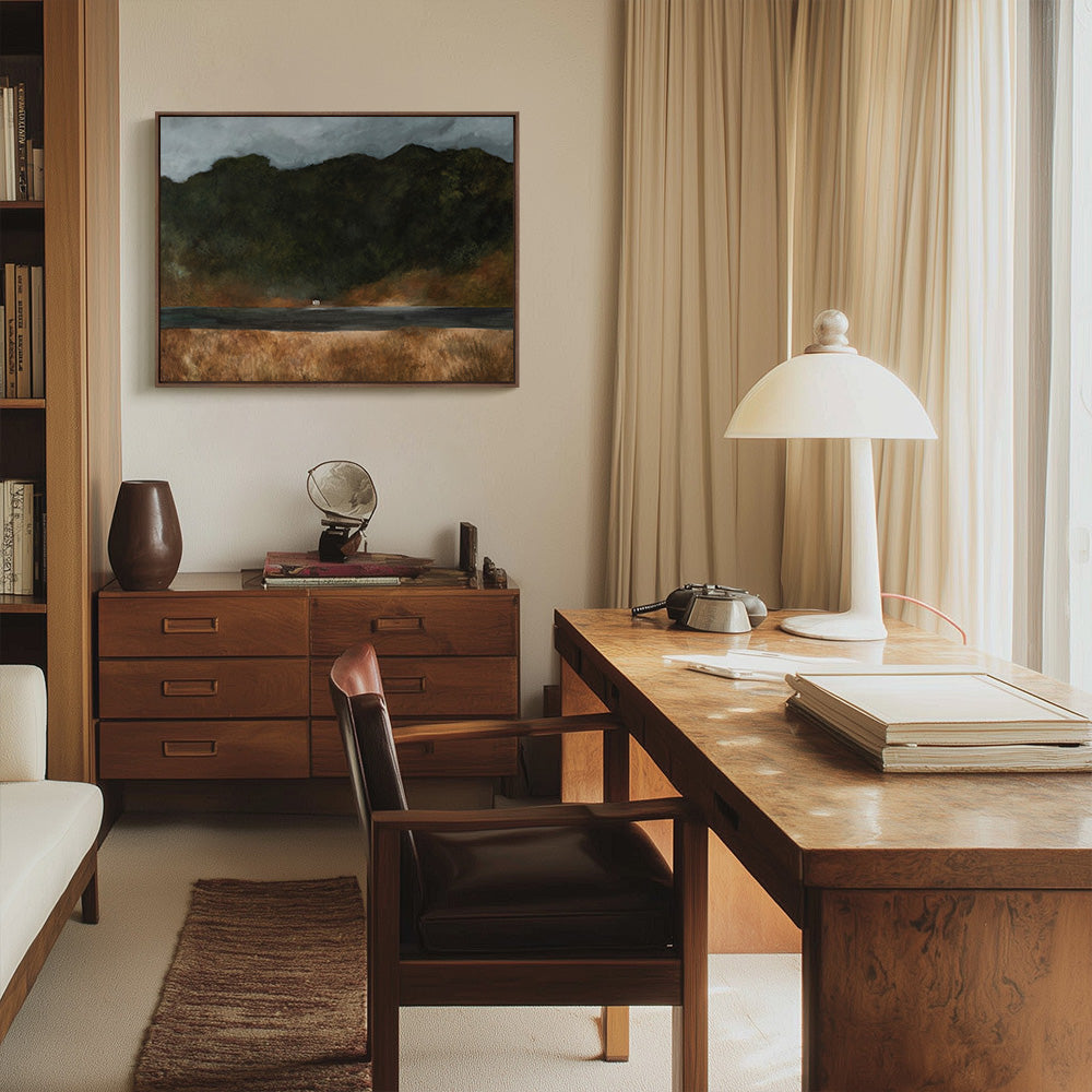 Abstract painting Scottish Highlands 03 in a dark brown frame hanging in a bright home office above a wooden dresser