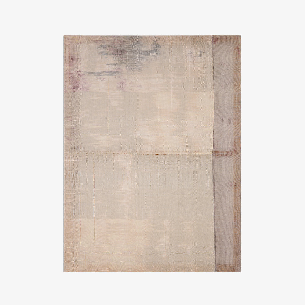 Neutral colored textile art with faint ethereal patterns in shades of taupe beige and soft grey
