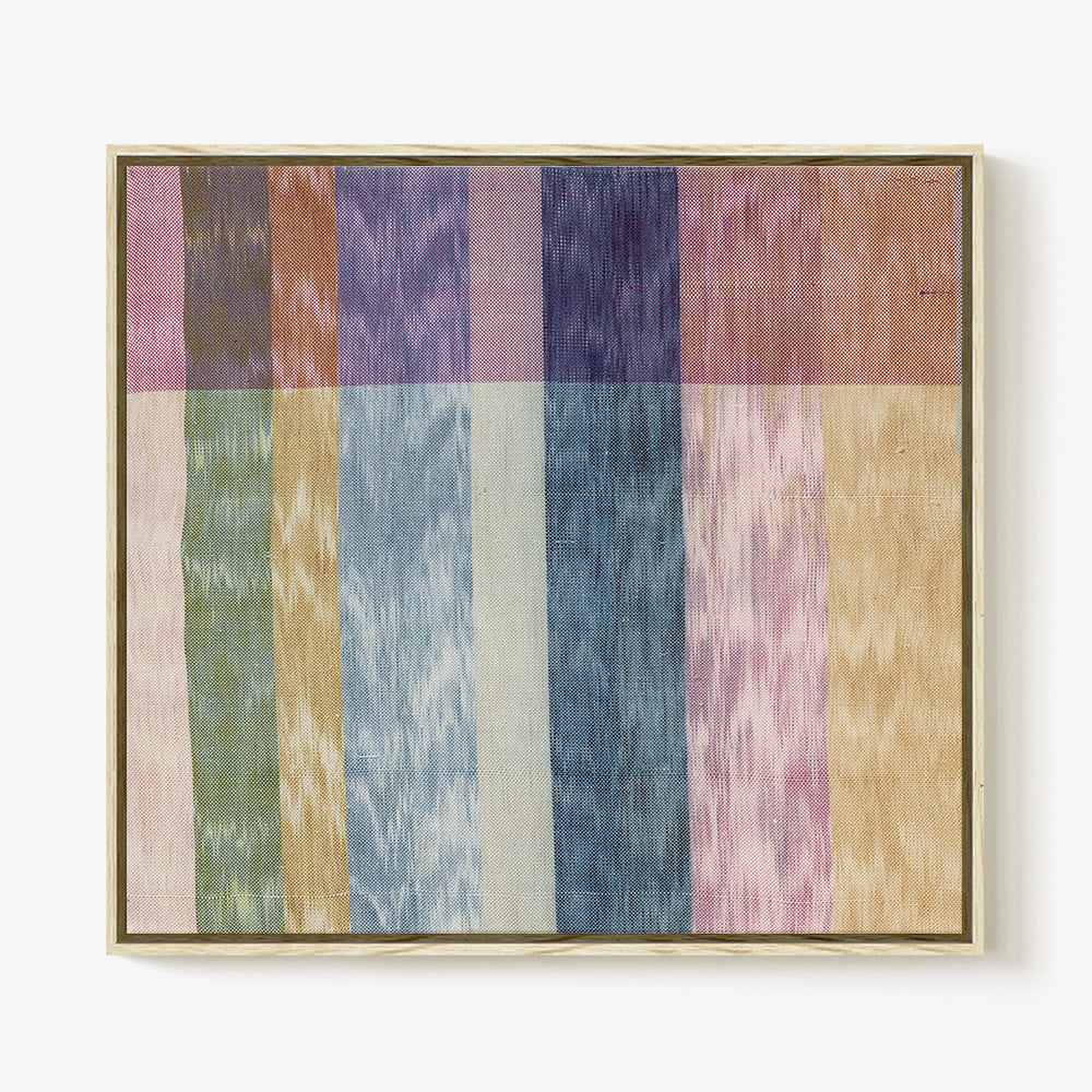 Textile artwork featuring vertical multi-colored stripes in muted pastels of blue pink yellow and green