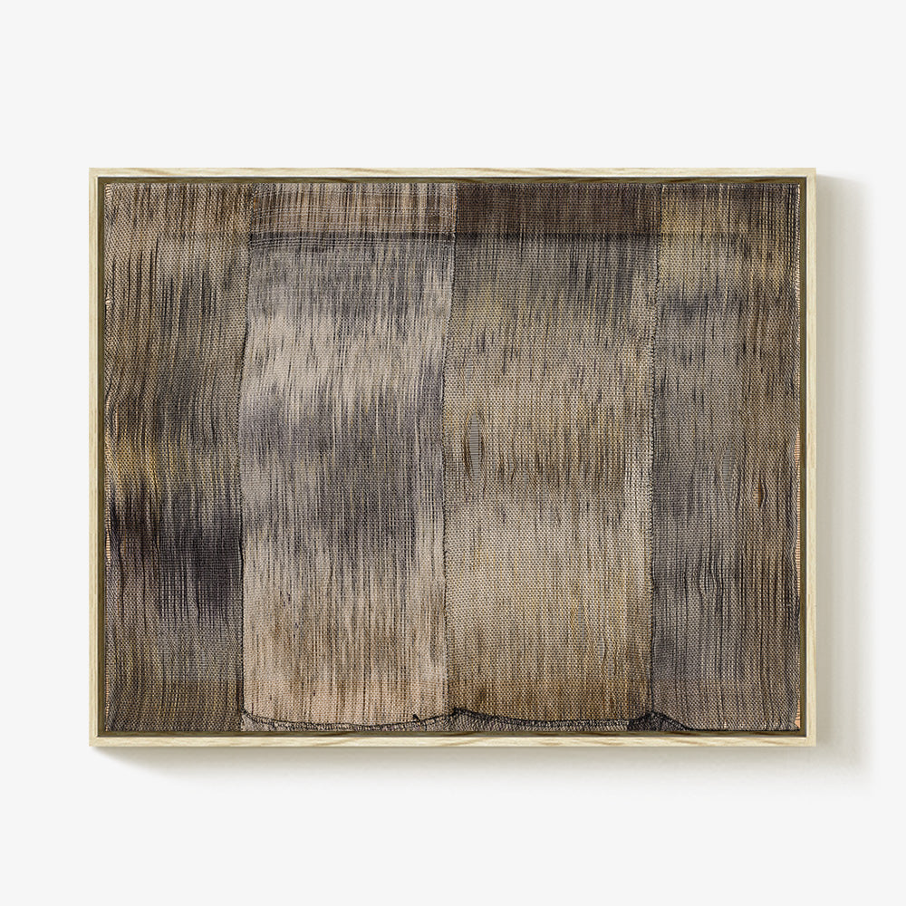 Abstract textile art with vertical stripes in shades of gray beige and brown in a light wood frame