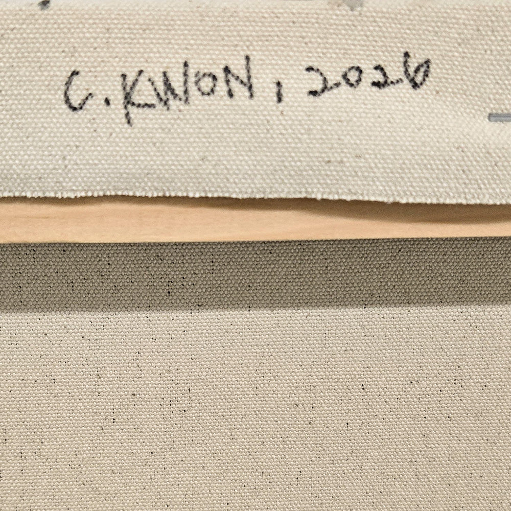 Close-up of the reverse side of a canvas showing wooden stretcher bars and the artist signature C KWON 2026