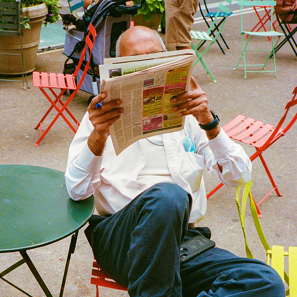 Guy Reading Paper